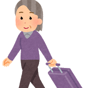 キャリーバッグを持ったおばさん